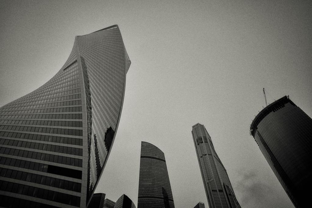 grayscale photo of the evolution tower in moscow russia