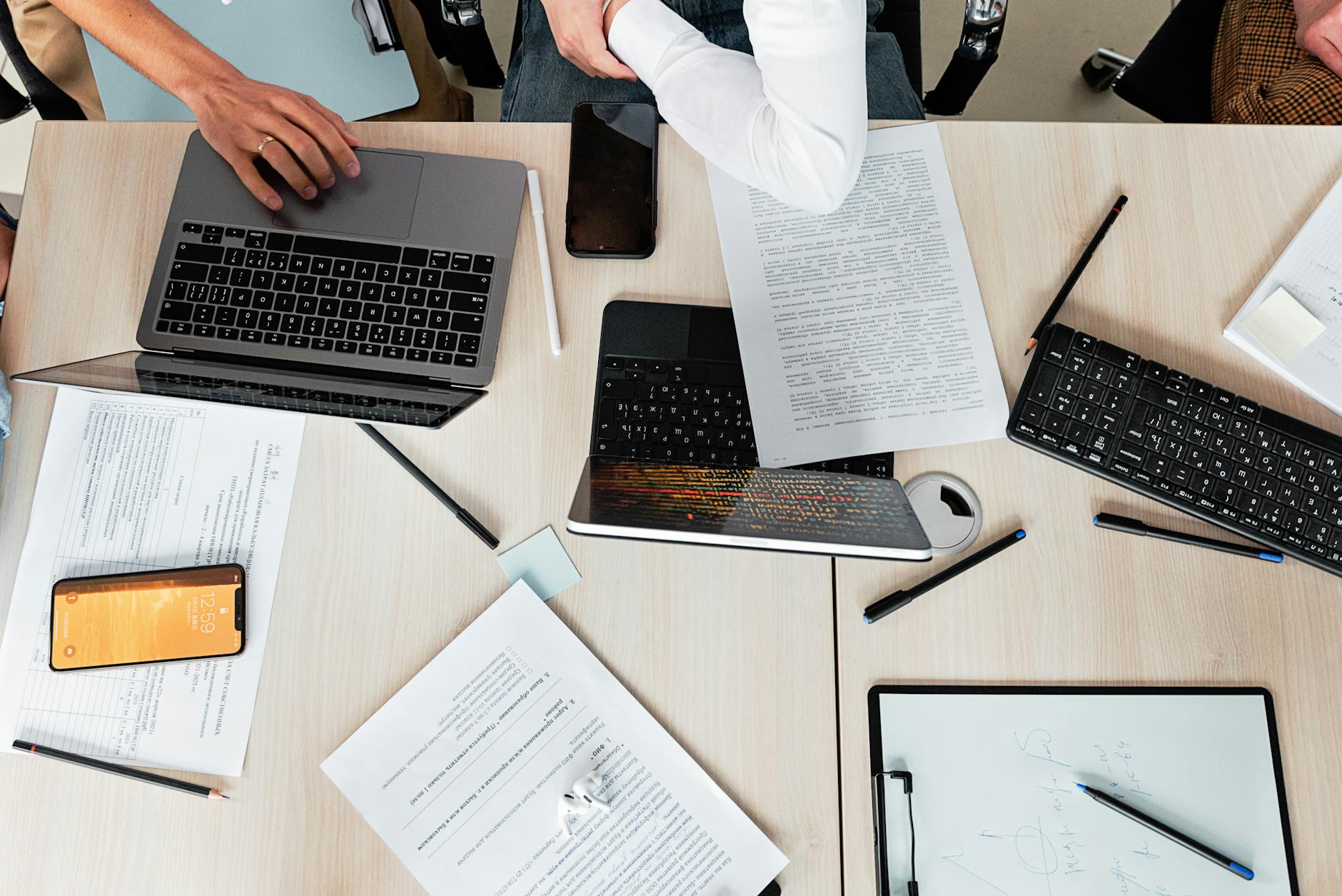 laptops and documents on desk
