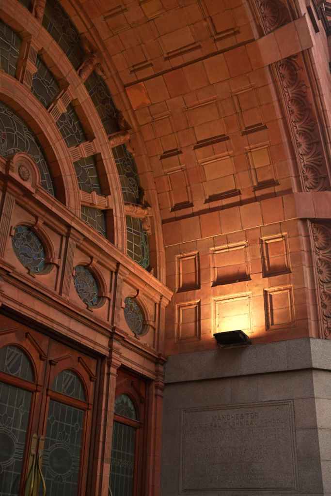 historic brick archway exterior with stained glass